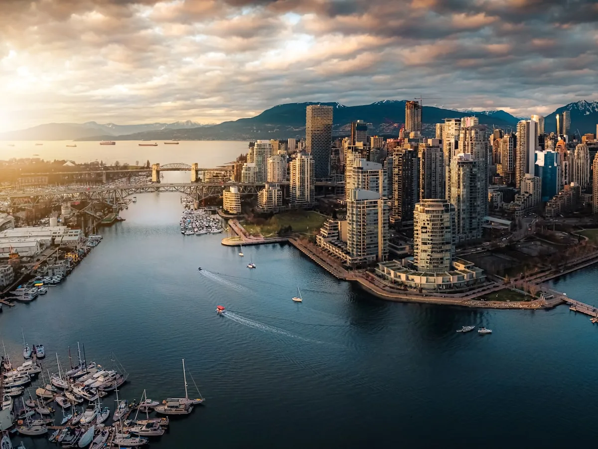 Downtown Vancouver skyline and Coal Harbour waterfront at dusk