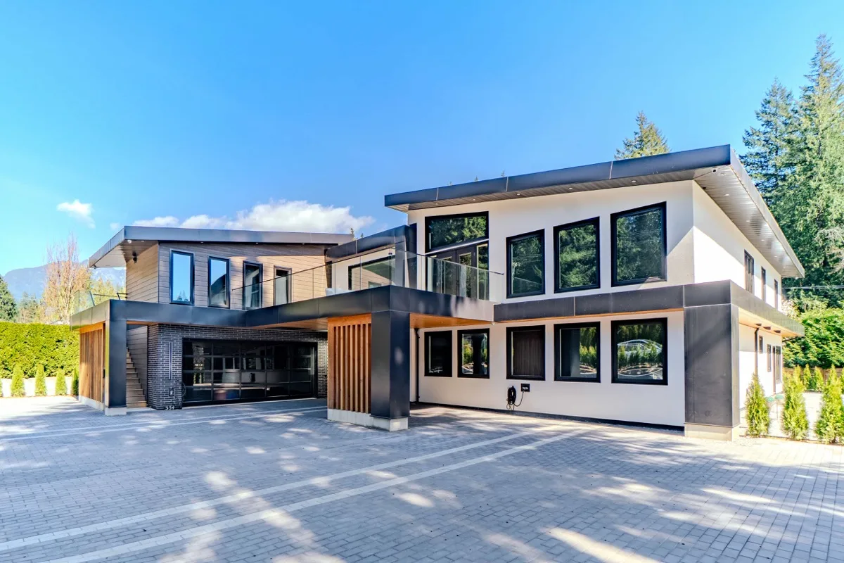 Luxury modern home wide drone perspective